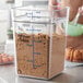 Carlisle 1195607 22 Qt. Clear Square Polycarbonate Food Storage Container with Blue Graduations Main Thumbnail 1