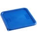 A blue square Carlisle polypropylene lid on a food storage container.