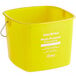 A yellow Noble Products King-Pail cleaning bucket with a handle and white text.