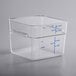 A Carlisle clear plastic food storage container with blue writing.