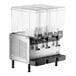 A Vollrath refrigerated beverage dispenser with three clear containers.