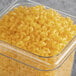 A container of Barilla gluten-free elbow pasta.