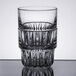 A close-up of a Libbey Everest stackable rocks glass with a textured design.