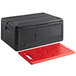 A black plastic CaterGator food pan carrier with a red hot board inside.