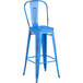 A blue metal Lancaster Table & Seating outdoor barstool with a black seat.