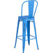 A blue metal Lancaster Table & Seating outdoor cafe barstool with a backrest.