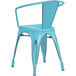 A blue metal Lancaster Table & Seating outdoor arm chair with metal armrests.