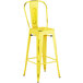 Lancaster Table & Seating Alloy Series Distressed Yellow Metal Indoor / Outdoor Industrial Cafe Barstool with Vertical Slat Back and Drain Hole Seat Main Thumbnail 1