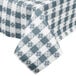A close-up of a blue gingham checkered Intedge vinyl tablecloth on a table.