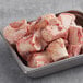 A tray of frozen Warrington Farm Meats short beef marrow femur bones.