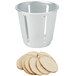A silver container with sliced potatoes using a Vollrath King Kutter #6 cone.