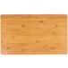 A rectangular bamboo platter with a wood surface.