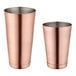 Two copper Acopa Boston Shaker cups on a white background.