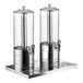 An Acopa stainless steel and polycarbonate beverage dispenser stand with two glass dispensers.