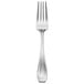 An Oneida Voss II stainless steel dinner fork with a silver handle and four prongs.