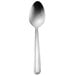 A Delco Dominion stainless steel teaspoon with a white handle.