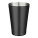 An Acopa matte black cocktail shaker tin. A matte black cup with a stainless steel lid.