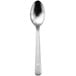 A silver 18/0 stainless steel teaspoon with a white handle.