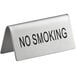 A close up of a Choice stainless steel "No Smoking" table tent sign with black text on a white background.