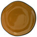 A close-up of a brown International Tableware Luna porcelain plate with a black rim.