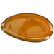 An International Tableware terracotta oval platter with a black rim.