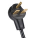 A close-up of a black and gold Avantco electrical plug.