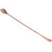 An Acopa copper bar spoon with a long handle and a pointed tip.