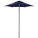 A Lancaster Table & Seating navy blue umbrella on a metal pole.