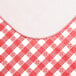 A red and white checkered vinyl table cover with a textured gingham pattern.