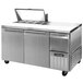 A Continental Refrigerator stainless steel sandwich prep table with two doors and a top.