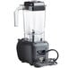 A Hamilton Beach Rio drink blender with a clear container and black base with a cord.