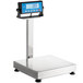 An AvaWeigh digital receiving scale with a screen on a stand.