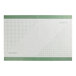 A rectangular silicone work mat with a green border and a grid pattern printed on the surface.