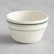 An Acopa ivory stoneware bouillon cup with green lines on it.