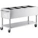A stainless steel Backyard Pro steam table with four compartments on a counter.