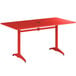 A Lancaster Table & Seating red rectangular table with metal legs.