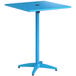 A blue square Lancaster Table & Seating bar height table with a metal base and umbrella hole.