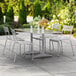 Lancaster Table & Seating 32" x 60" Silver Powder-Coated Aluminum Dining Height Outdoor Table with Umbrella Hole Main Thumbnail 1
