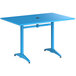 A blue rectangular Lancaster Table & Seating dining table with a metal base.