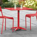 Lancaster Table & Seating 24" x 32" Red Powder-Coated Aluminum Dining Height Outdoor Table with Umbrella Hole Main Thumbnail 1