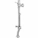 A chrome Sloan water closet flushometer with a handle and silver pipe.