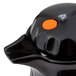 A black plastic Vollrath SwirlServe beverage server with an orange button.
