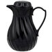 A black plastic Vollrath beverage server with a handle.