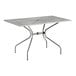 A Lancaster Table & Seating rectangular outdoor table with a metal top and modern legs.