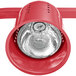 An Avantco red free standing heat lamp with a red bulb.