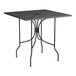 A Lancaster Table & Seating Harbor Black square outdoor table with ornate legs.