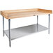 A wood table with a galvanized metal shelf and legs.