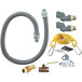 A Dormont gas connector hose kit with a grey flexible hose and yellow parts.