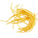 A pile of shredded yellow noodles on a white background.