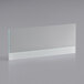 A clear rectangular glass with a white border.